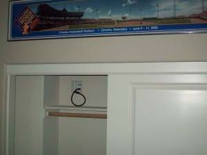 Outlet and cables in closet